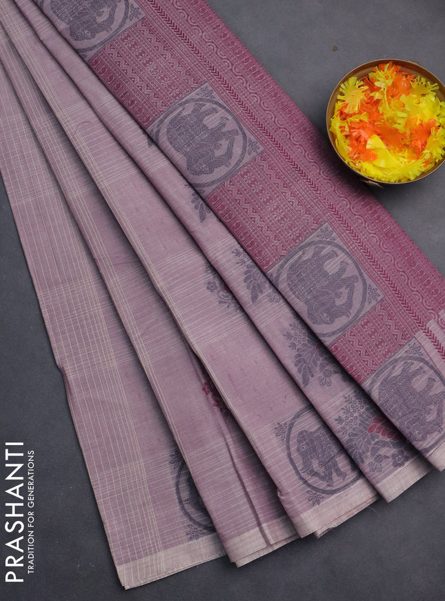 Nithyam cotton saree pastel purple with allover checks & thread woven buttas in borderless style