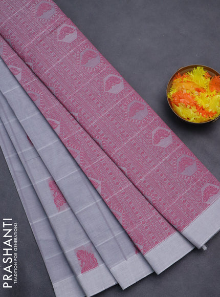 Nithyam cotton saree grey with allover checks & thread buttas in borderless style