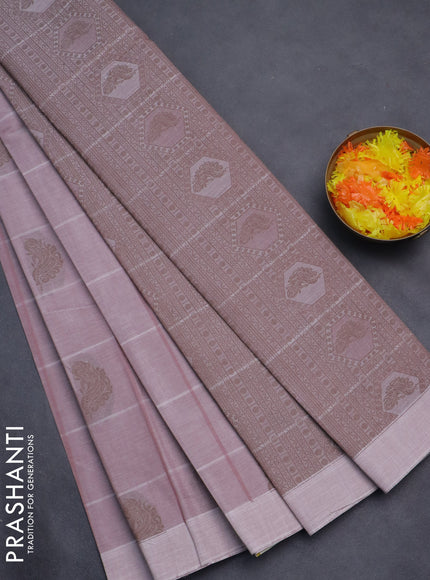 Nithyam cotton saree pastel brown with allover checks & thread buttas in borderless style