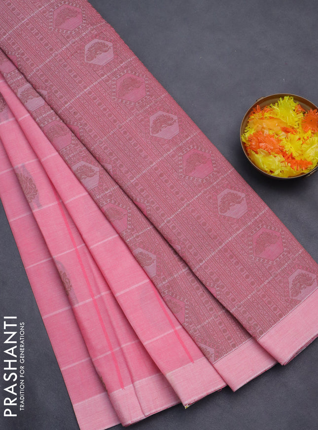 Nithyam cotton saree peach pink with allover checks & thread buttas in borderless style