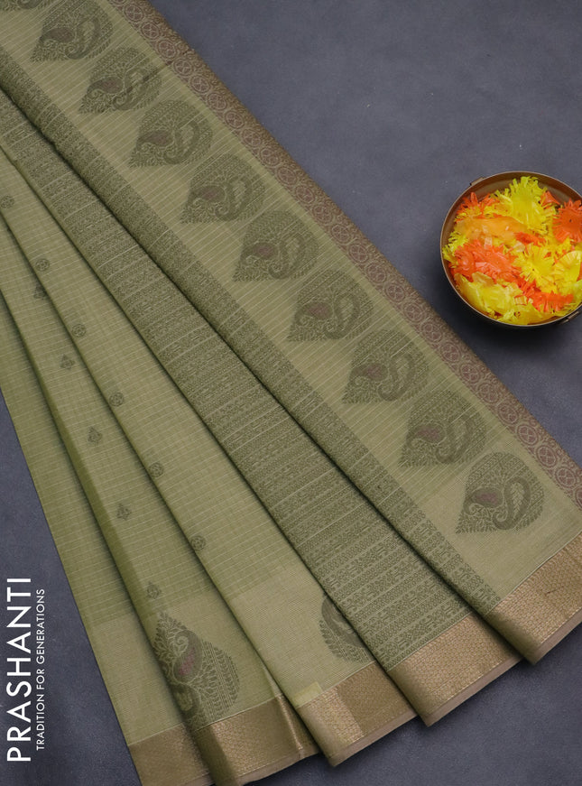 Nithyam cotton saree pastel green with allover checks & thread buttas and zari woven border