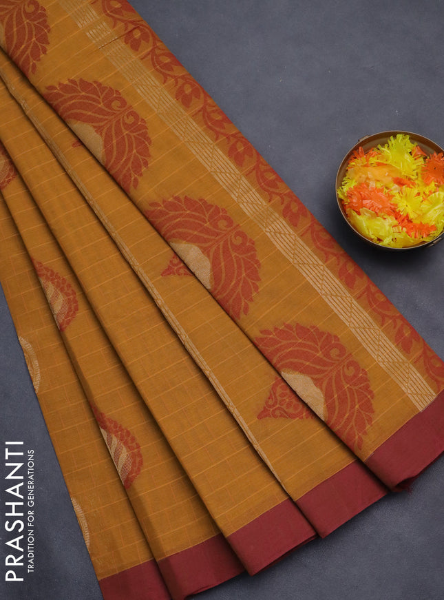 Nithyam cotton saree mustard yellow and maroon with allover thread weaves & zari buttas and simple border
