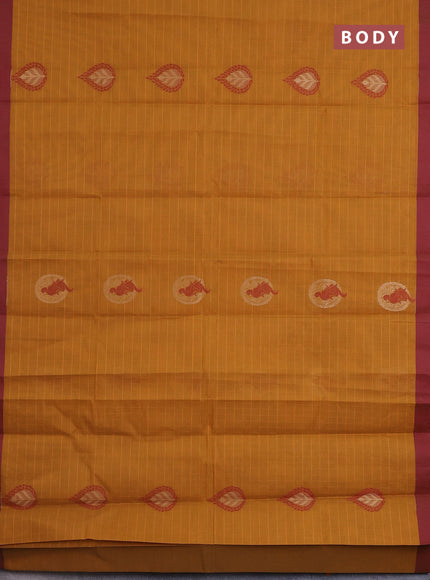 Nithyam cotton saree mustard yellow and maroon with allover thread weaves & zari buttas and simple border