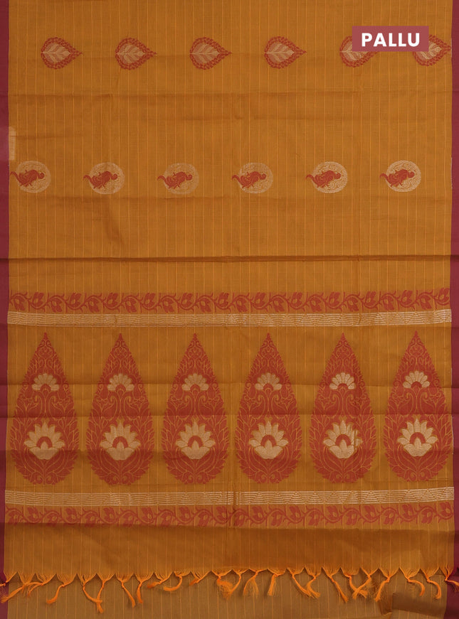 Nithyam cotton saree mustard yellow and maroon with allover thread weaves & zari buttas and simple border