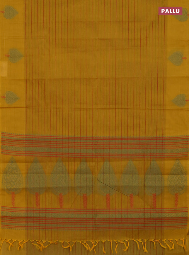 Nithyam cotton saree mustard yellow with allover stripe pattern and thread woven butta border