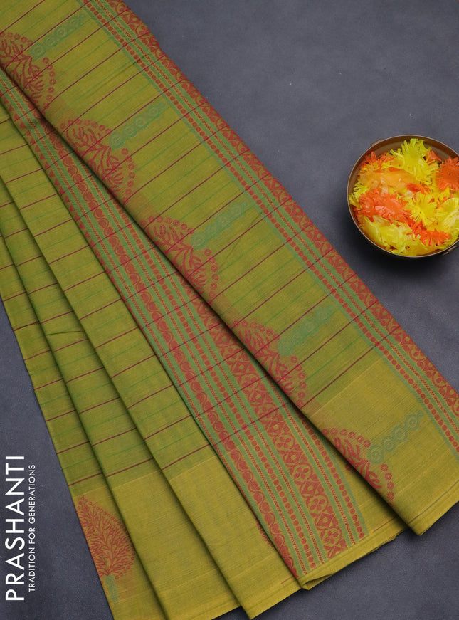 Nithyam cotton saree lime green with allover stripe pattern and thread woven butta border