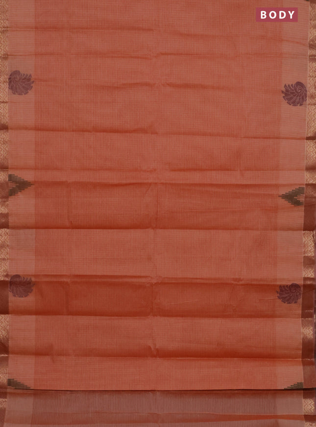 Nithyam cotton saree rust shade with allover thread stripe pattern and zari woven border