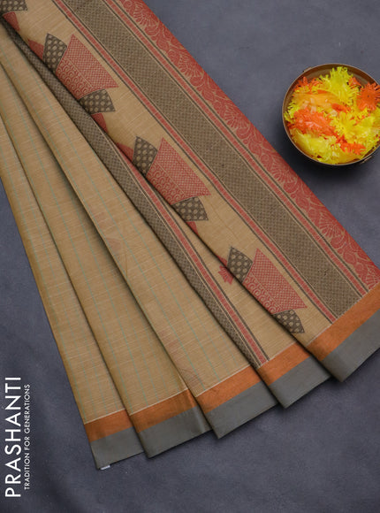 Nithyam cotton saree sandal and grey with allover thread weaves & buttas and simple border