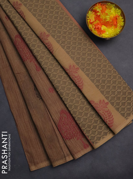 Nithyam cotton saree dark sandal and sandal with thread woven buttas in borderless style