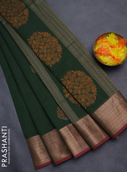 Nithyam cotton saree green and dual shade of pink with allover self emboss & thread woven buttas and thread woven border