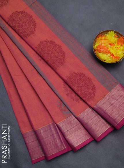 Nithyam cotton saree dual shade of pinkish yellow and magenat pink with allover self emboss & thread woven buttas and thread woven border