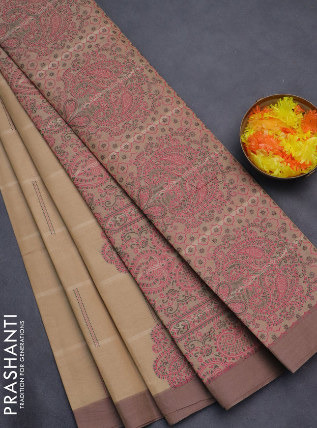 Nithyam cotton saree sandal and pastel brown with thread woven buttas and simple border