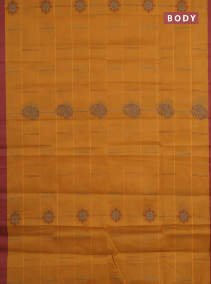 Nithyam cotton saree dark mustard and maroon with thread woven buttas and simple border