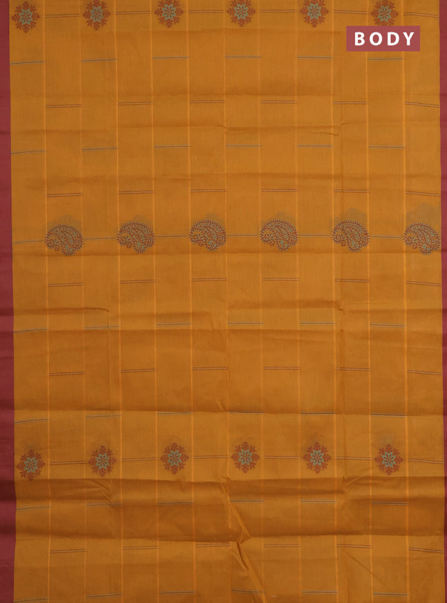 Nithyam cotton saree dark mustard and maroon with thread woven buttas and simple border