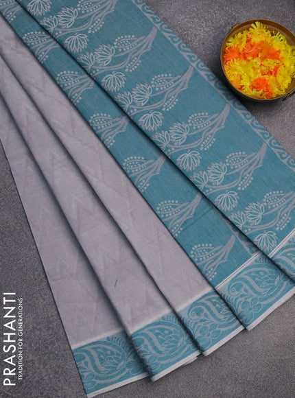 Coimbatore cotton saree grey and teal green with allover self emboss and thread woven border