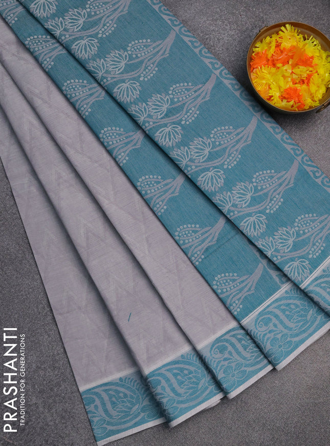 Coimbatore cotton saree grey and teal green with allover self emboss and thread woven border