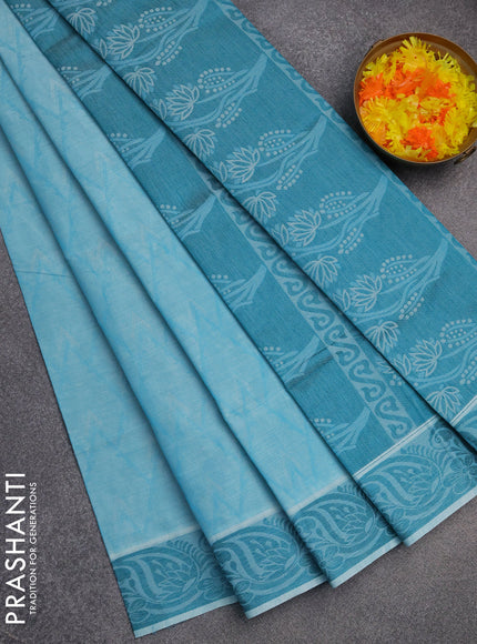 Coimbatore cotton saree teal blue with allover self emboss and thread woven border