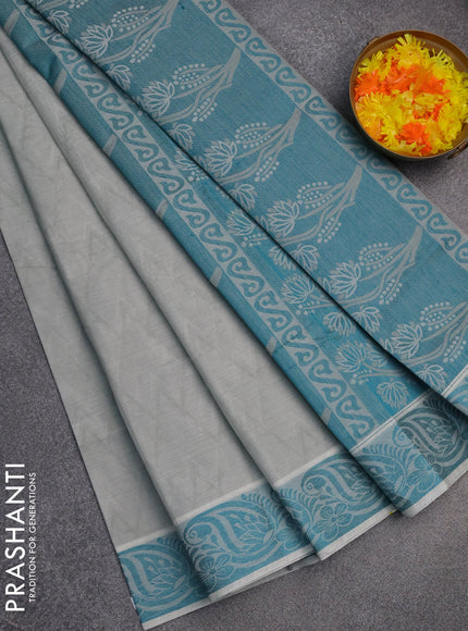 Coimbatore cotton saree grey and teal green with allover self emboss and thread woven border