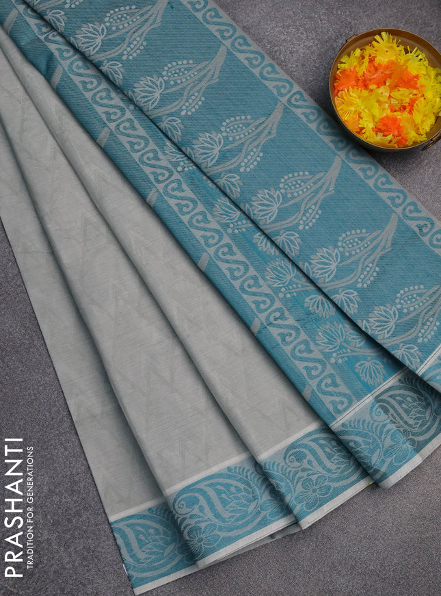 Coimbatore cotton saree grey and teal green with allover self emboss and thread woven border