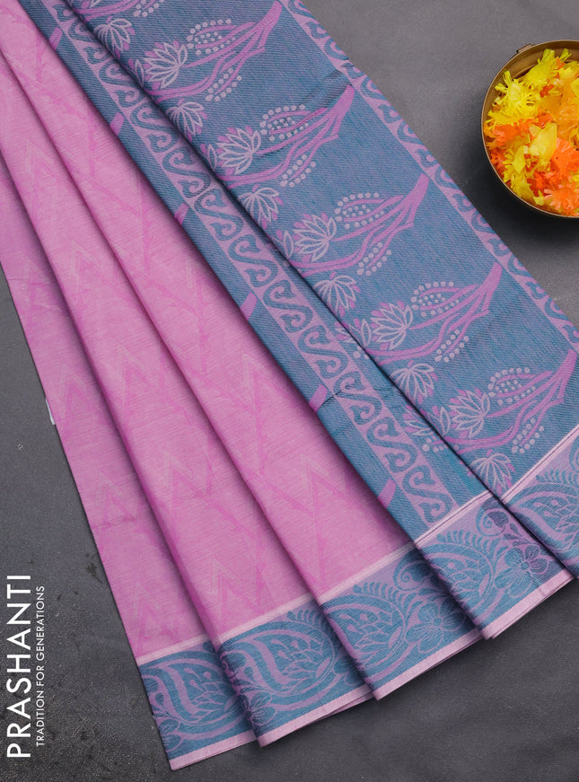 Coimbatore cotton saree lotus pink and teal green with allover self emboss and thread woven border