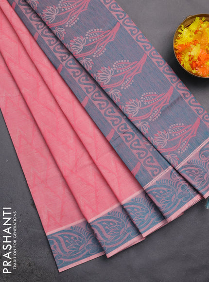 Coimbatore cotton saree peach pink and teal green with allover self emboss and thread woven border