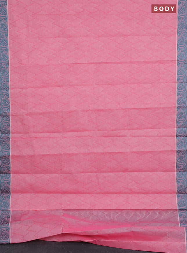 Coimbatore cotton saree peach pink and teal green with allover self emboss and thread woven border