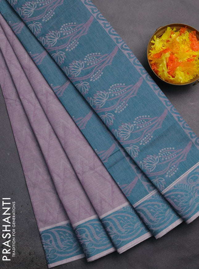 Coimbatore cotton saree pastel lavender and teal green with allover self emboss and thread woven border