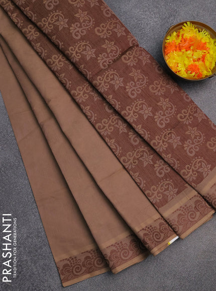 Coimbatore cotton saree pastel brown and coffee brown with allover self emboss and thread woven border