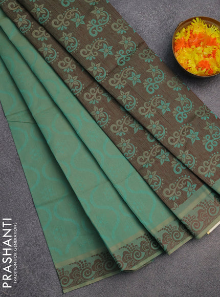 Coimbatore cotton saree dual shade of teal blue and coffee brown with allover self emboss and thread woven border