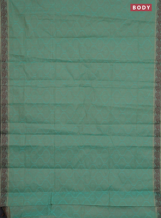 Coimbatore cotton saree dual shade of teal blue and coffee brown with allover self emboss and thread woven border
