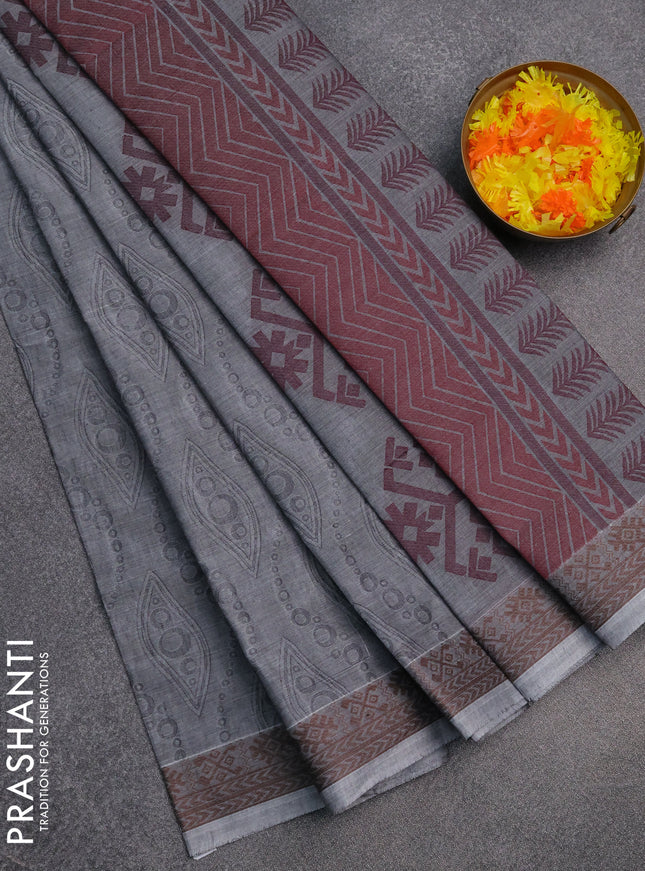 Coimbatore cotton saree grey and coffee brown with allover self emboss and thread woven border