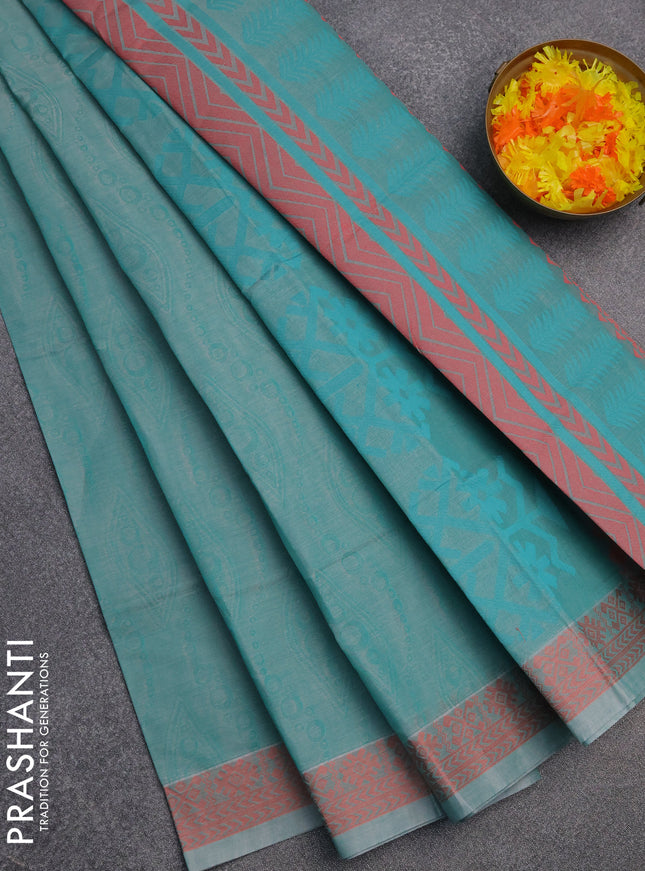 Coimbatore cotton saree teal blue and orange with allover self emboss and thread woven border