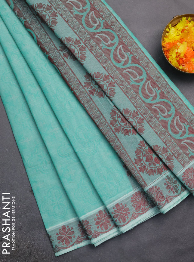 Coimbatore cotton saree teal green shade and maroon with allover self emboss and thread woven border