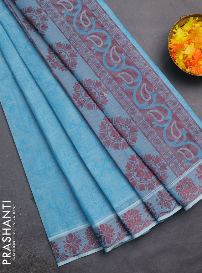 Coimbatore cotton saree teal blue and maroon with allover self emboss and thread woven border