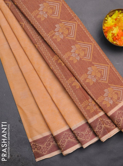 Coimbatore cotton saree pale orange and coffee brown with allover self emboss and thread woven border