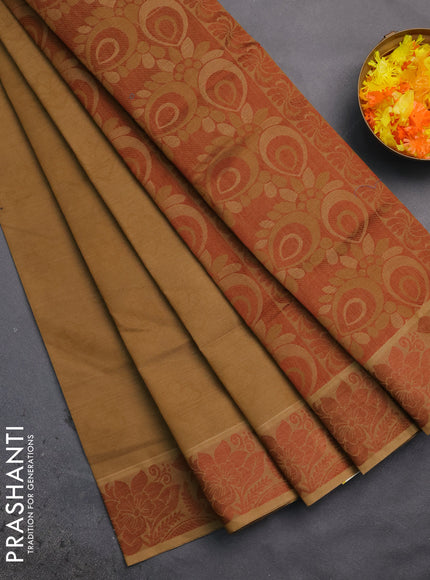 Coimbatore cotton saree dark sandal and brown with allover self emboss and thread woven border