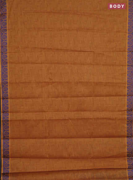 Coimbatore cotton saree dark mustard and blue with allover self emboss and thread woven border