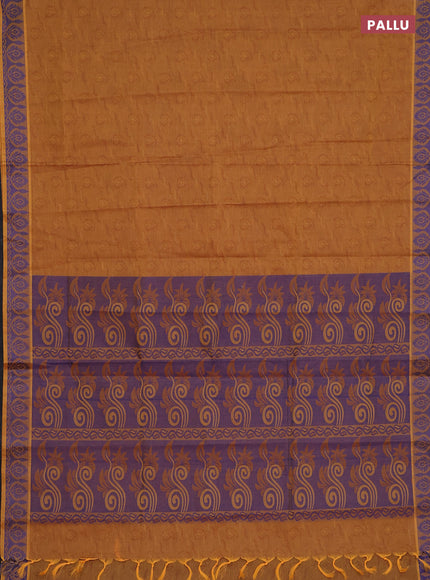 Coimbatore cotton saree dark mustard and blue with allover self emboss and thread woven border