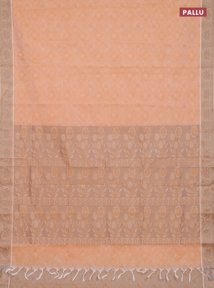 Coimbatore cotton saree pale orange and beige with allover self emboss and thread woven border