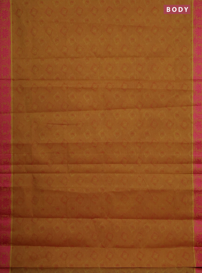 Coimbatore cotton saree dual shade of mustard yellow and pink with allover self emboss and thread woven border