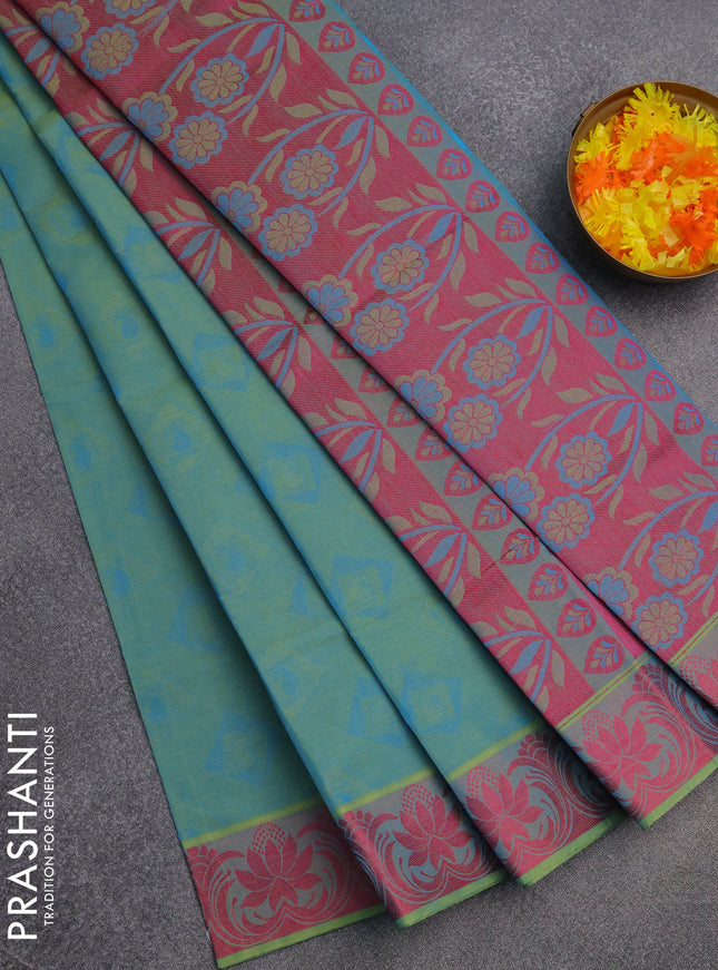 Coimbatore cotton saree dual shade of bluish green and pink with allover self emboss and thread woven border