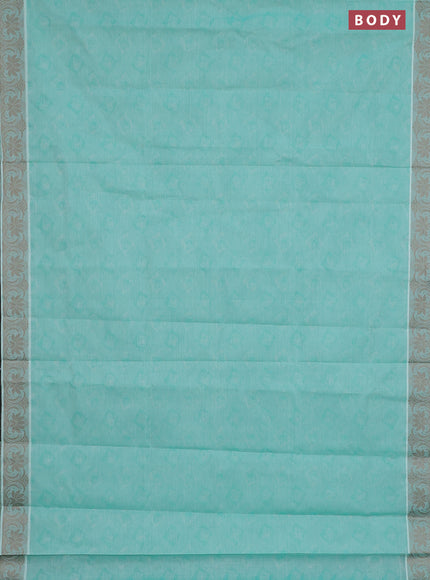 Coimbatore cotton saree mild teal green and beige with allover self emboss and thread woven border