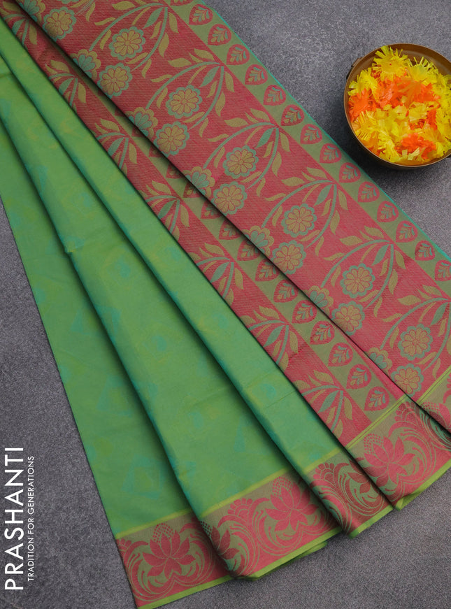 Coimbatore cotton saree dual shade of green and pink with allover self emboss and thread woven border