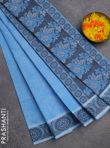 Coimbatore cotton saree light blue and black with allover self emboss and thread woven border