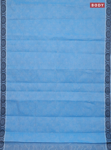 Coimbatore cotton saree light blue and black with allover self emboss and thread woven border