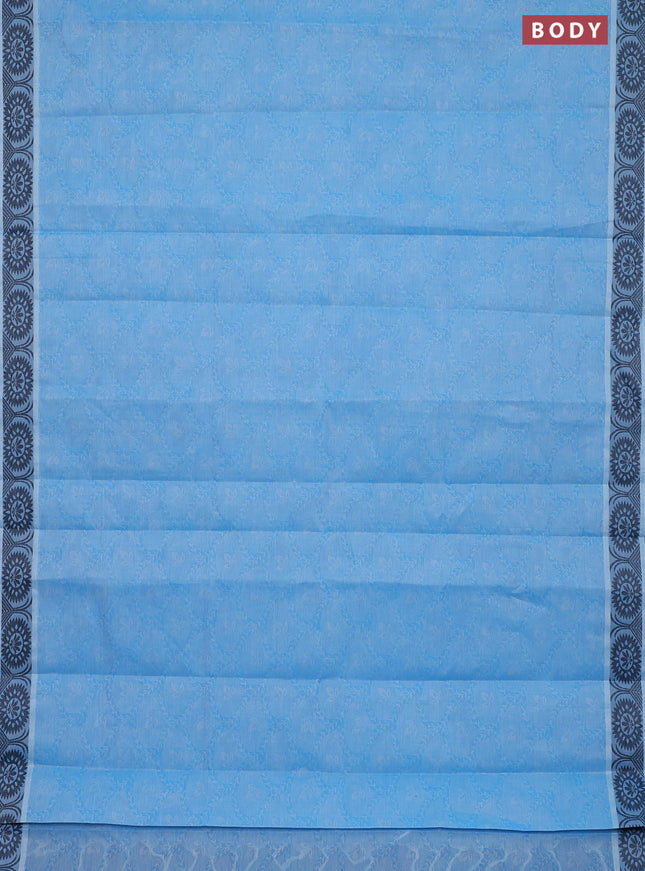 Coimbatore cotton saree light blue and black with allover self emboss and thread woven border