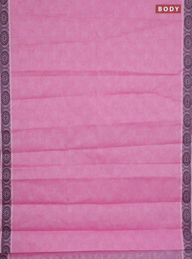 Coimbatore cotton saree light pink and black with allover self emboss and thread woven border