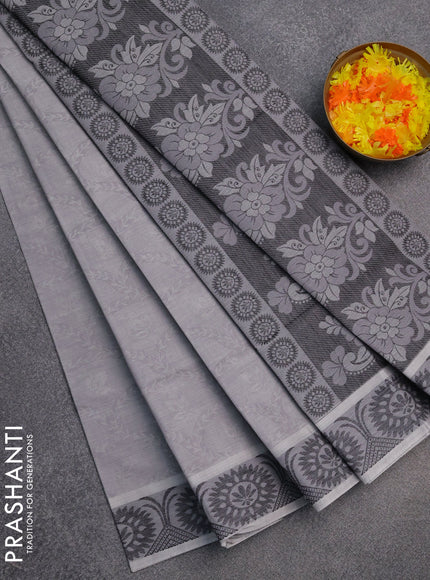 Coimbatore cotton saree pastel grey and black with allover self emboss and thread woven border