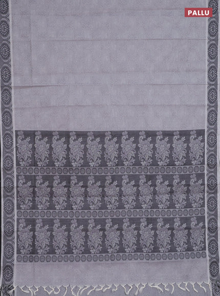 Coimbatore cotton saree pastel grey and black with allover self emboss and thread woven border