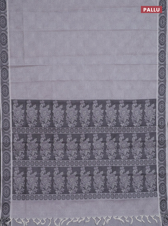 Coimbatore cotton saree pastel grey and black with allover self emboss and thread woven border